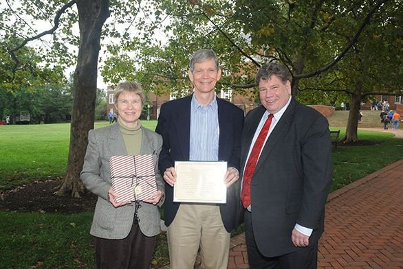 Betsy and Carl Seastrum with former President Christopher Nelson