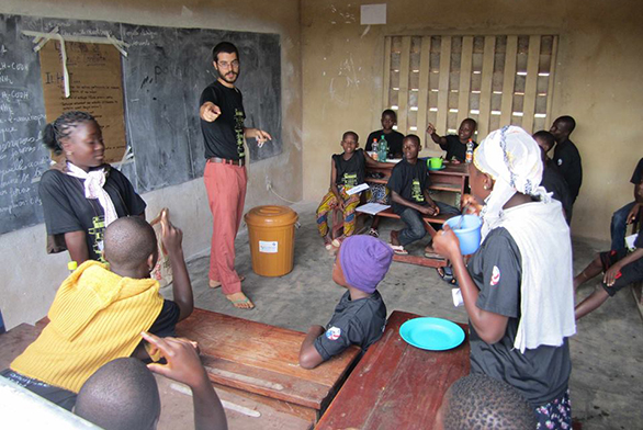 Chazaq Llinas helps prepare students for the national spelling bee in Benin in 2015.