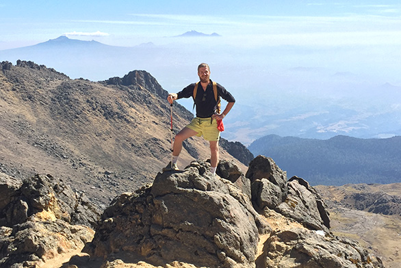 Tristan Janes stands on the side of Iztaccihuatl in Mexico.