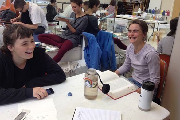 Students laughing in art room