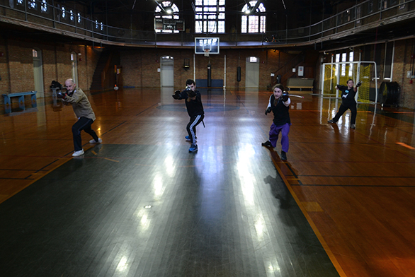 The HEMA club practices lunges in Iglehart Gymnasium.