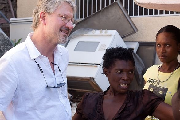 Diggs speaks with Haitians are part of his work with Beyond Borders.