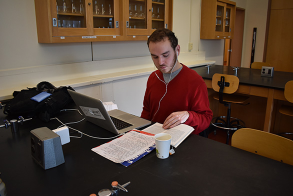 Senior Sebastian Barajas works on his essay.