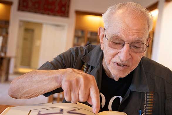 David-Feldstein-at-Summer-Classics-reading-Haggadah.jpg