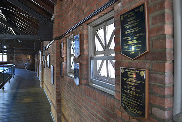 Plaques line the walls of Iglehart Gymnasium on the St. John's campus in Annapolis.