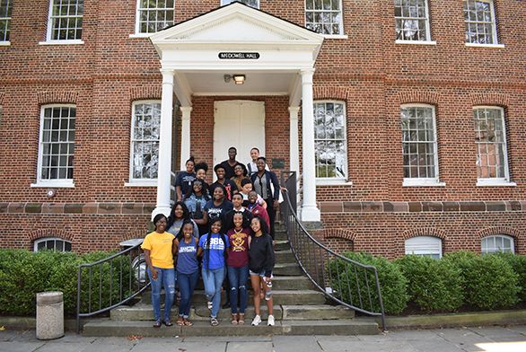 Students in UNCF program on steps of McDowell Hall
