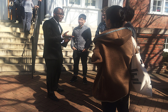 Senior Jermaine Brown greets friends after his oral examination.