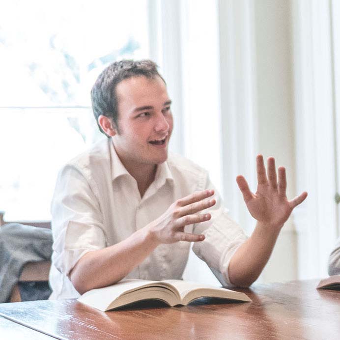 Student speaking in a classroom