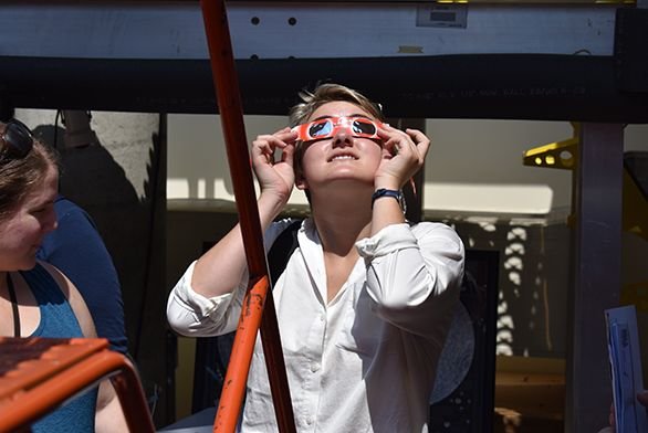 Maddie Nell Jane (A20) watches the eclipse from the third-floor observatory in Annapolis.