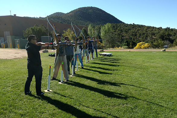 Members of the Archery Club line up in Santa Fe.