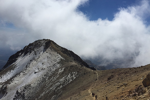 Hikers trek along Iztaccihuatl in Mexico.