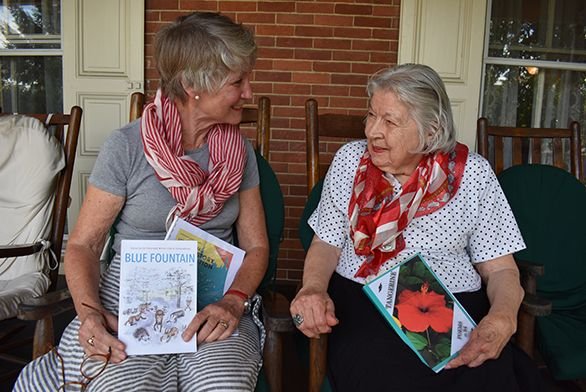 Constance Lindgreen and Mary Jean Bell hold their books