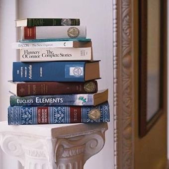 Stack of St Johns College Program Books