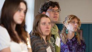 Several-UWC-students-listening-to-presentation.jpg